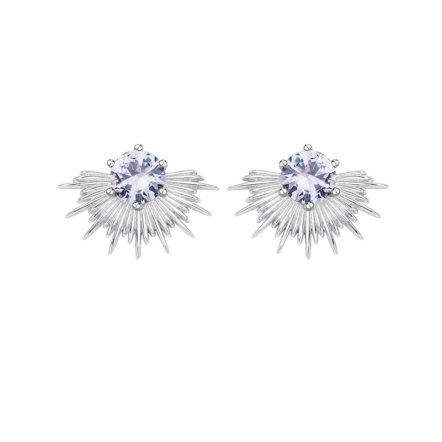 Pair of silver earrings with clear gemstones on a white background